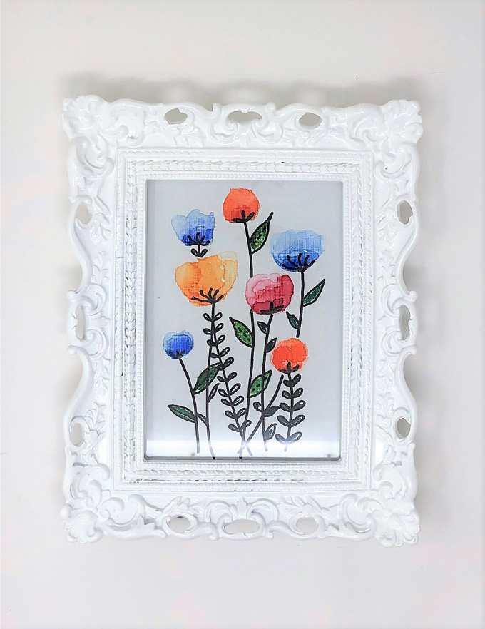 floral watercolor canvas in white frame