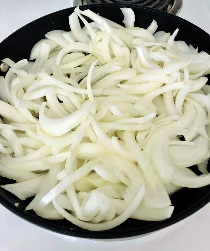 raw onions in pan