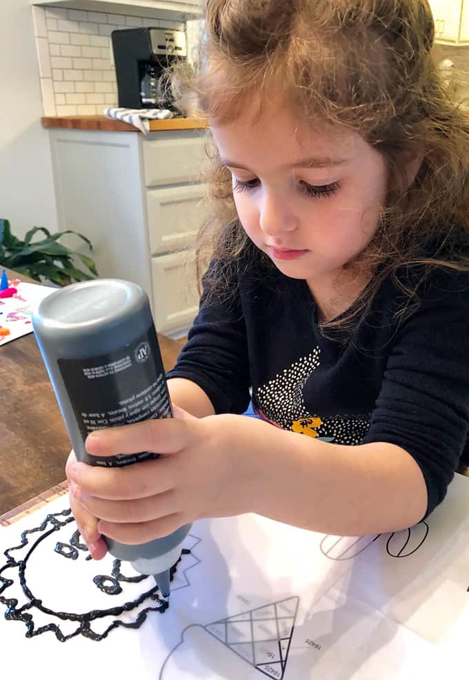 girl making suncatcher