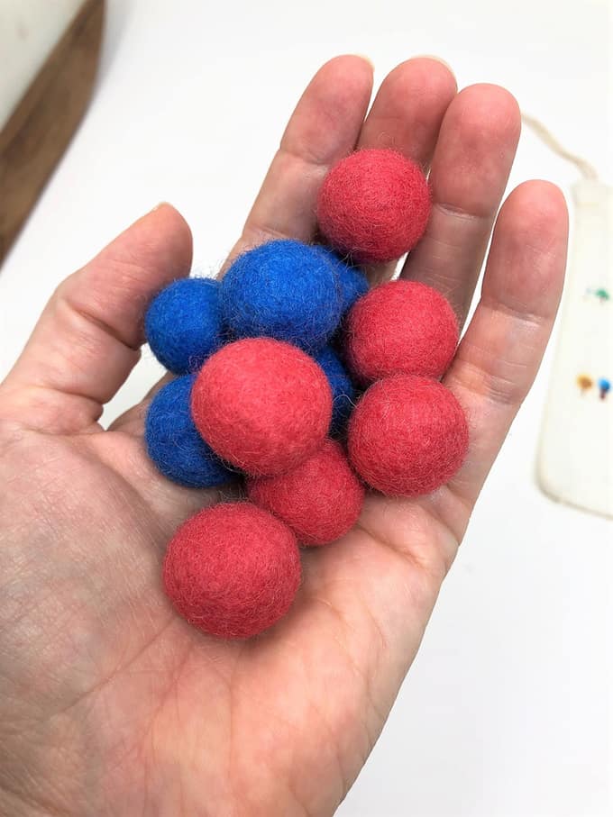 handful of wool felt balls