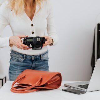 woman photographing camera