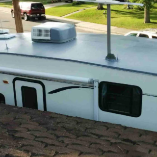 RV roof with air conditioner unit.